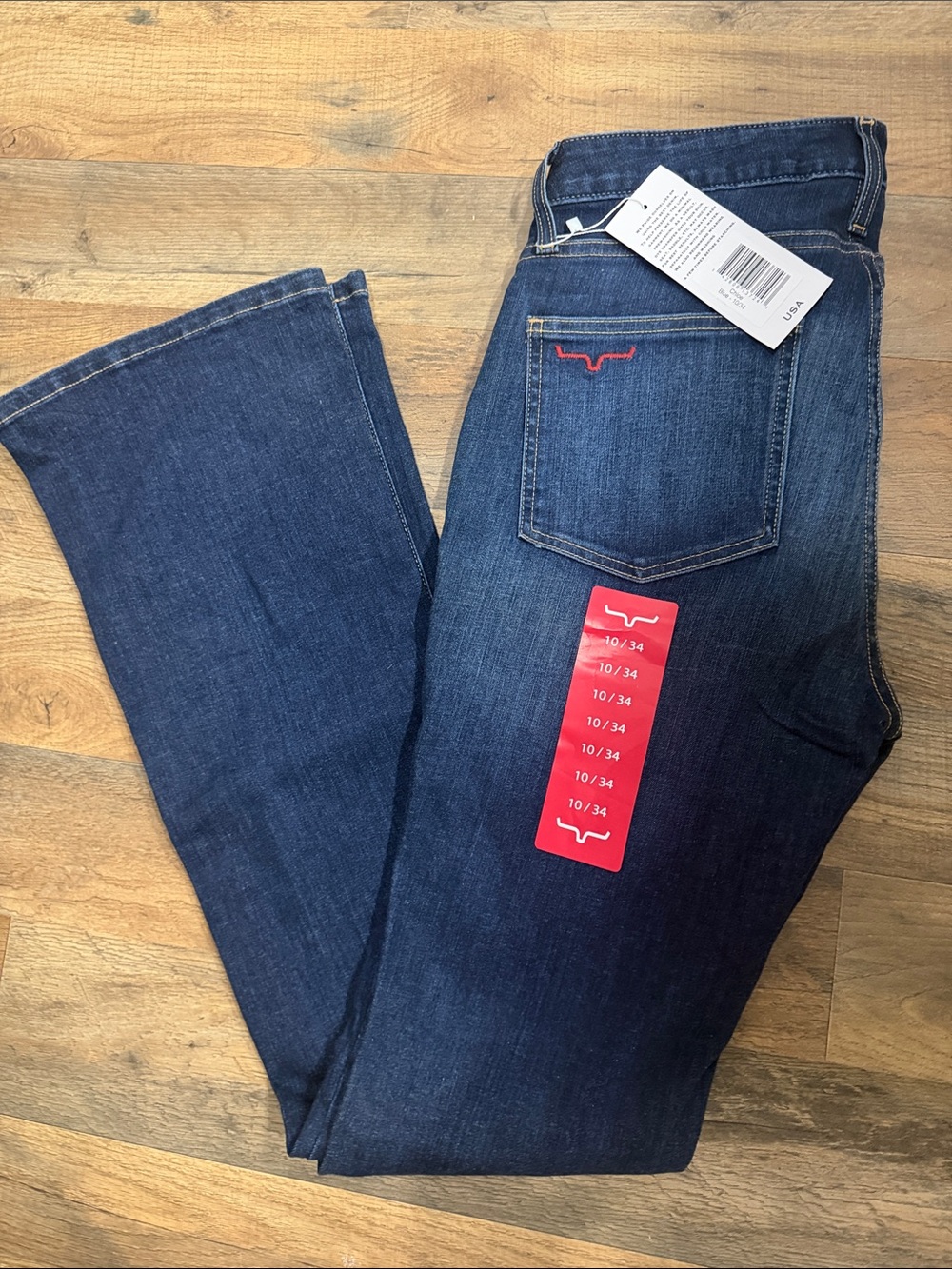 Kimes Ranch Chloe Dark Blue boot cut Jeans with Red Pocket Accent